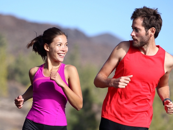 Happy couple running